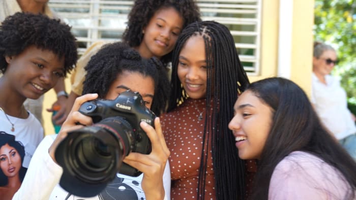 Anita Marshall with the school girls of Politécnico Santo Esteban Rivera school